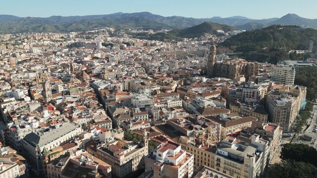 Cinematic drone video unveils a panoramic view of Malaga, a vibrant coastal city nestled in Andalusia province, southern Spian.