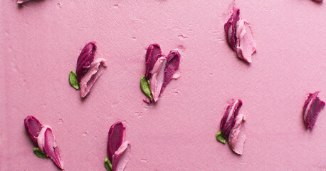 Overhead view of silky smooth buttercream texture, top view of flowers being made in frosting