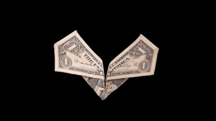 Origami flying butterfly dollar bill with clear alpha channel background.