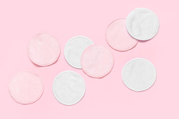 Reusable cotton pads on pink background