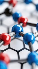 Close-up of a molecular structure model with vibrant red and blue spheres connected by metal bonds, set against a white hexagonal background.