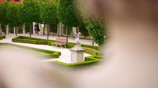 statue in the Baroque Garden of the Bratislava Castle in Slovakia. Summer travel in Europe, popular tourism destination in Eastern Europe.
