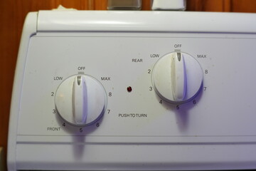 Close-Up of Stove Temperature Control Knobs