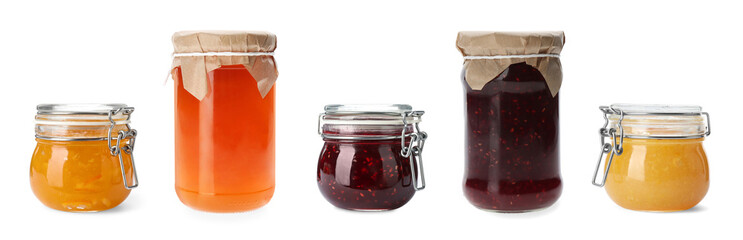 Collection of jars with different jams isolated on white