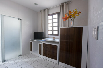 elegant dining room interior design, marble stone table and dark wooden chairs, luxury residential architecture, classic style dining area with modern crystal chandelier, white ceramic tile floor 