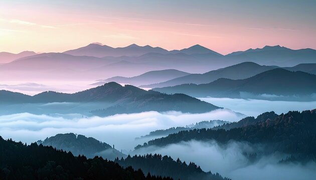 A scenic landscape featuring layers of mountains partially obscured by fog at sunrise. The image has a serene and peaceful atmosphere.