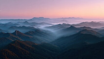 Fototapeta premium Panoramic view of mountain range in soft pastel hues at sunset or sunrise