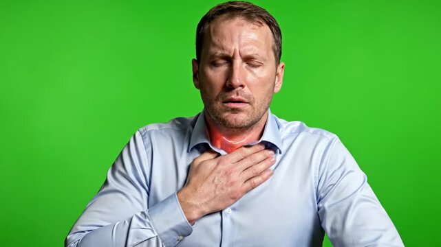 Stressed Man Experiencing Throat Discomfort and Difficulty Breathing Against a Vibrant Green Screen Background