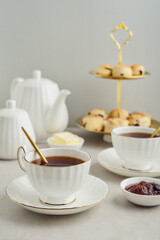 English Afternoon Tea  in elegant white porcelain cups