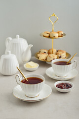 English Afternoon Tea  in elegant white porcelain cups