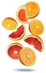dynamic arrangement of scattered orange, blood orange, and grapefruit slices and segments floating against a dark background, vibrant composition photograph.