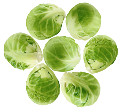 whole, raw, fresh green brussels sprouts scattered and floating in a circular arrangement, showcasing healthy produce isolated against a deep transparent background.