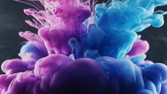 Macro shot of vibrant magenta and cyan liquid inks rapidly dissolving and swirling into a hazy, gaseous abstraction in a transparent medium visual, reaction, background