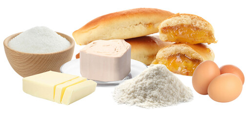 collection of raw baking ingredients like sugar, yeast, flour, butter, and eggs, displayed next to freshly baked sweet buns or pastries, isolated on black.