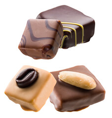 gourmet square chocolate pralines and candies featuring various fillings and toppings, including coffee bean, peanut, and decorative drizzle, isolated on black.