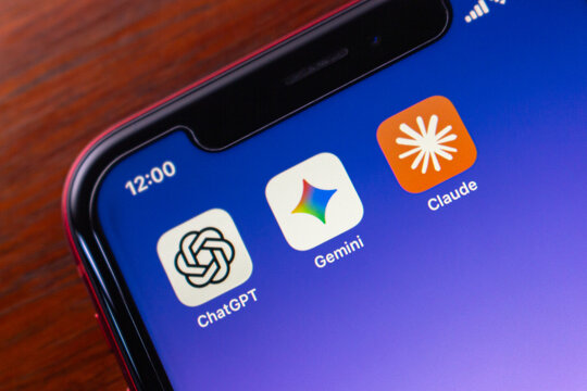 Quito, ECUADOR - Nov 25 2025 : ChatGPT, Google Gemini and Claude AI chatbot app icons are displayed on an iPhone screen.