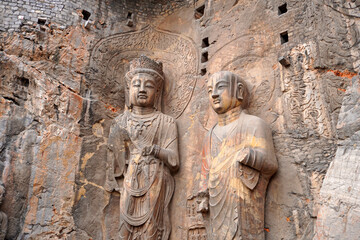 Longmen Grottoe : The Bodhisattava sculpture of Fengxian Cave (or Li Zhi Cave)  Chinese Buddhist art. Located in Louyang, Henan province China. Selective focus.