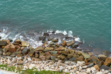 Breakwater stones along the seaside park trail in Hong Kong, China