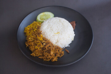 indonesia homemade cuisine named nasi krawu - a warm rice with seasoned shredded beef and shredded coconut meat