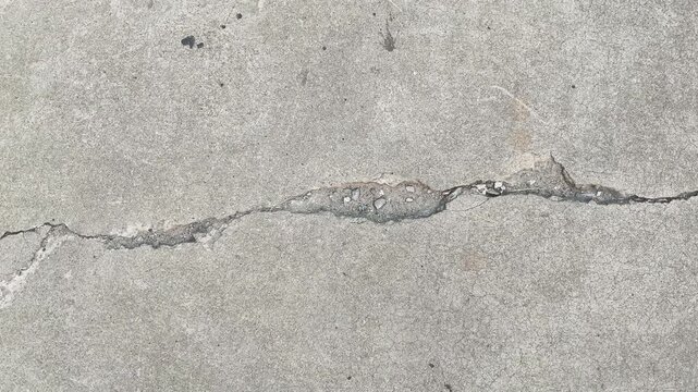 Road surfaces can become cracked from cement wear or get damaged due to earthquakes or prolonged use.