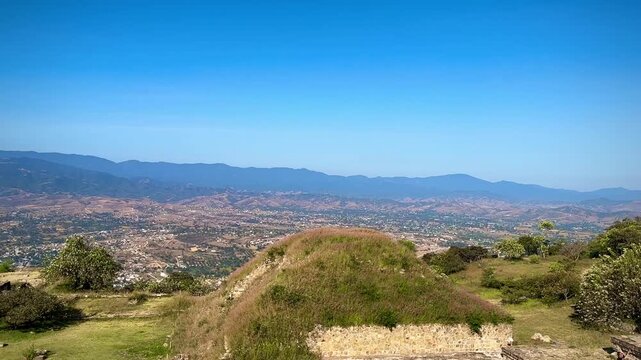 Tourists Walking on Ancient Pyramids of Monte Alban (Monte Alban, Oaxaca, Mexico)
