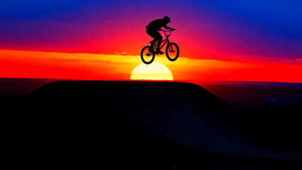 Bmx biking silhouette sunset extreme sports adventure jump rider bicycle stunt sky clouds sun action freedom challenge adrenaline recreation outdoors lifestyle competition skill trick