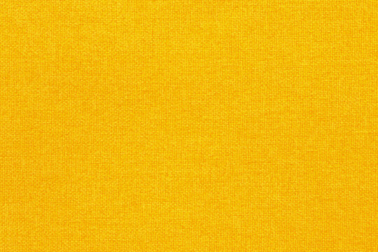 Yellow fabric cloth texture background, seamless pattern of natural textile.