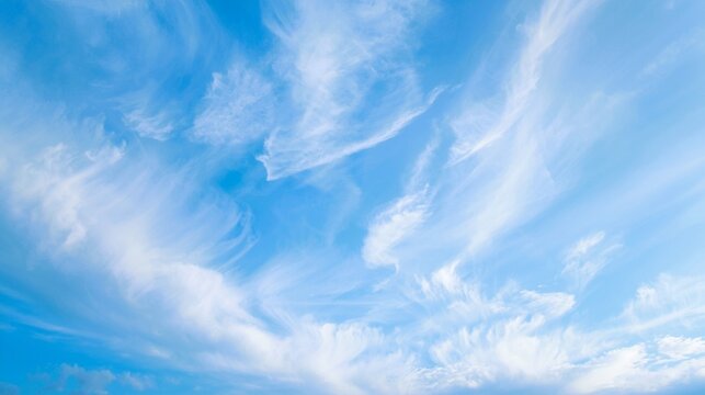 Dreamy pastel sky with soft wispy clouds — serene blue and white cloudscape, ethereal atmospheric background for wallpaper, banner, web design and nature-themed projects