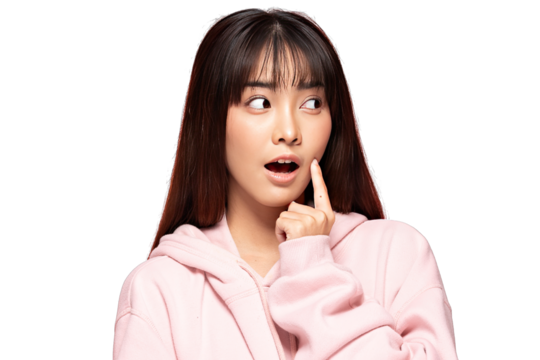 Asian Young Asian woman in pink hoodie with surprised thoughtful expression touching cheek, casual portrait with studio lighting