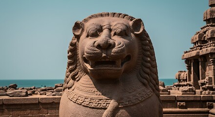 Ancient Stone Lion Sculpture at Shore Temple Mahabalipuram India.