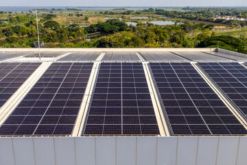 High-quality photo of solar panels mounted on a contemporary building rooftop, showcasing clean energy technology and sustainable urban infrastructure.