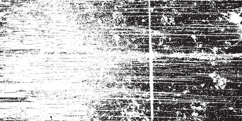Abstract grunge texture with distressed black and white scratches and dust.
