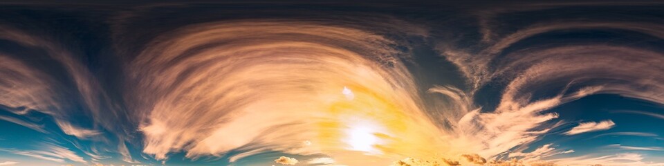 360 panorama of glowing sunset sky with bright Cirrus clouds. Seamless hdr spherical 360 panorama. Sky dome in 3D visualization, sky replacement for aerial drone panoramas. Weather and climate change
