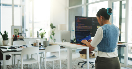 Typing, woman and computer screen with code, office and software development on website and...