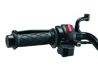 Close up of a black motorcycle handlebar grip and controls with red button isolated on a transparent background