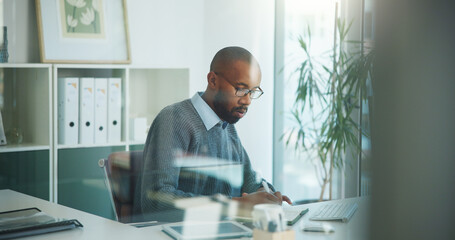 Writing, paperwork and business black man in office with finance report, proposal and budget...