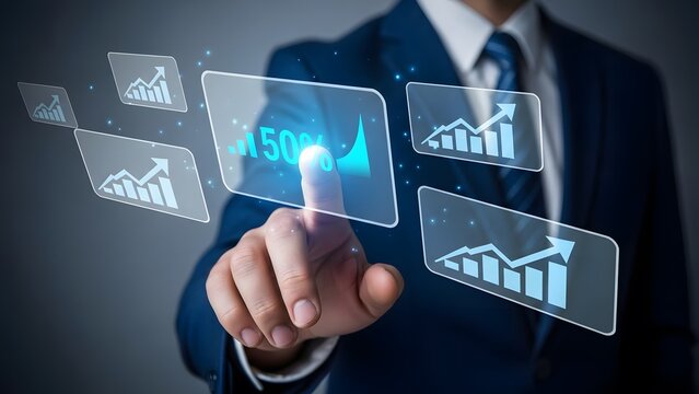 Businessman interacting with holographic graphs for business growth analysis