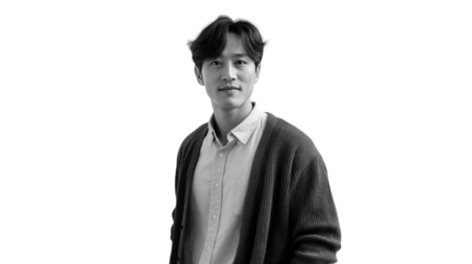 Black and White Studio Portrait: A composed and self-assured man in a studio portrait, his gaze directed forward as he stands confidently. 