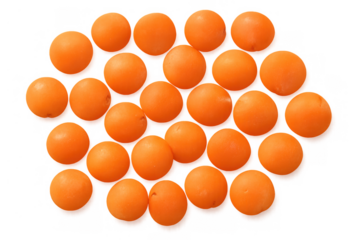 Raw orange lentils scattered forming a pattern, cooking ingredient for healthy food, transparent background