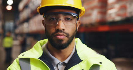 Portrait, man and goggles for logistics in warehouse with career pride, supply chain and freight....