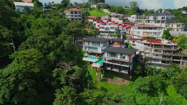 A pull-out aerial of Hōm Amara homestay perched on a forested hillside in Tagaytay City, Cavite, Philippines