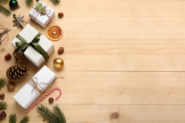 Christmas gifts on wooden background with space for text