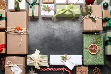Frame made of Christmas gifts on grunge background with space for text