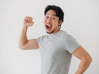 A Joyful Man is Celebrating His Success with Enthusiasm and Great Energy in This Moment