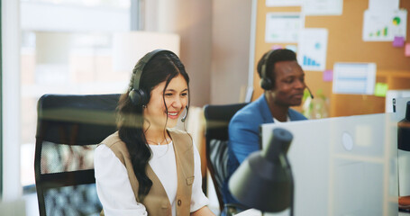 Obraz premium Happy woman, consultant or agency with headset in office for online advice or virtual assistance. Female person, employee or friendly agent with mic on computer for CRM communication, help or support