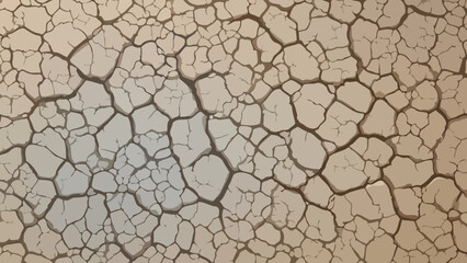 Close-up of cracked earth revealing a network of lines and textures, a symbol of drought