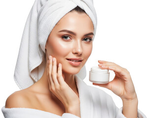Young woman in towel applying face cream for healthy, radiant skin
