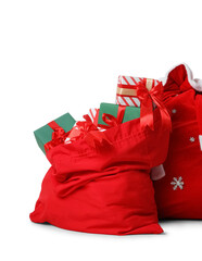Santa Claus bags full of gifts isolated on white background