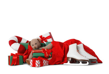 Santa Claus bag with gifts and ice skates isolated on white background
