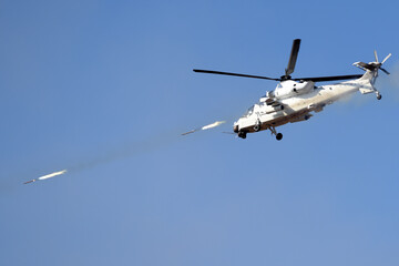 A South African Defence Force Rooivalk ground attack helicopter fires rockets during a capability demonstration in Bloemfontein, South Africa.